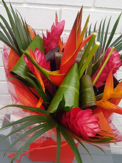 Costa Rica - Fresh tropicals direct from Costa Rica. These are super long lasting and dont mind heat. (the flowers may vary from the picture due to seasonal availability)