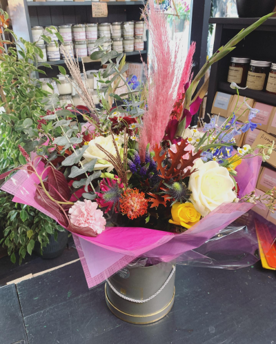 Secret Whispers - This luxury arrangement of flowers in a stylish Hat Box will be remembered for a long time!