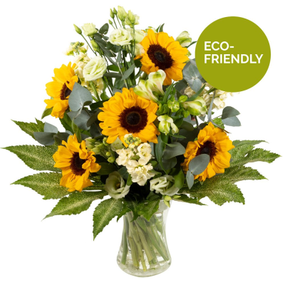 Sunny Spells - Sunshine, showers and beautiful flowers … The magnificent sunflower with an attendance of beautiful blossoms to complement, upheld with bright foliage.