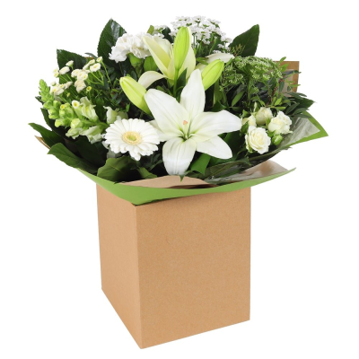 Classic Harmony - Share your sentiments with this beautiful arrangement of white and green blooms complemented by lush greenery. Presented in elegant wrapping.